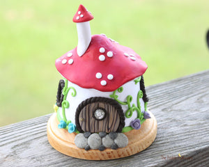 Mushroom Fairy House with vines and colorful flowers