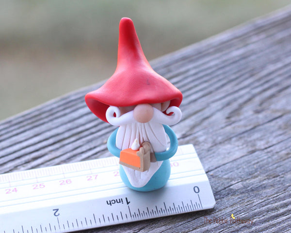 Gnome with pumpkin pie- miniature garden gnome figure - Maher