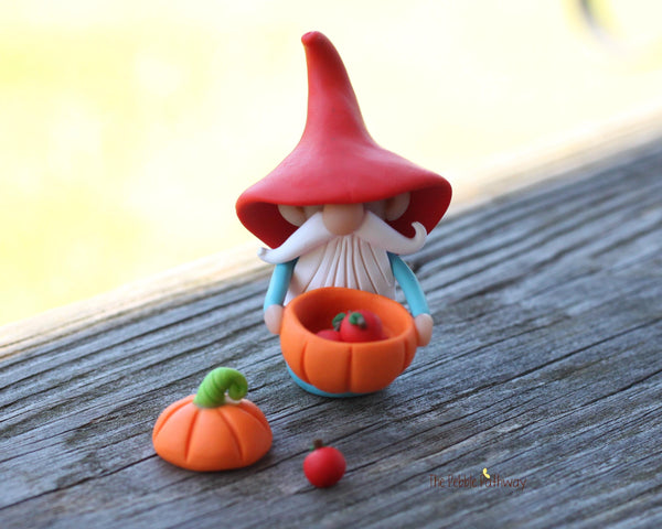 Gnome with pumpkin bowl full of apples - miniature garden gnome figure