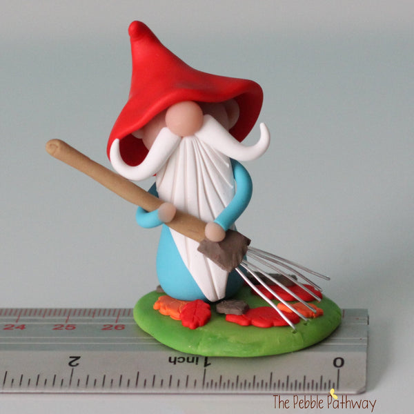 Gnome with rake and leaves - miniature garden gnome figure - Beacher - ThePebblePathway